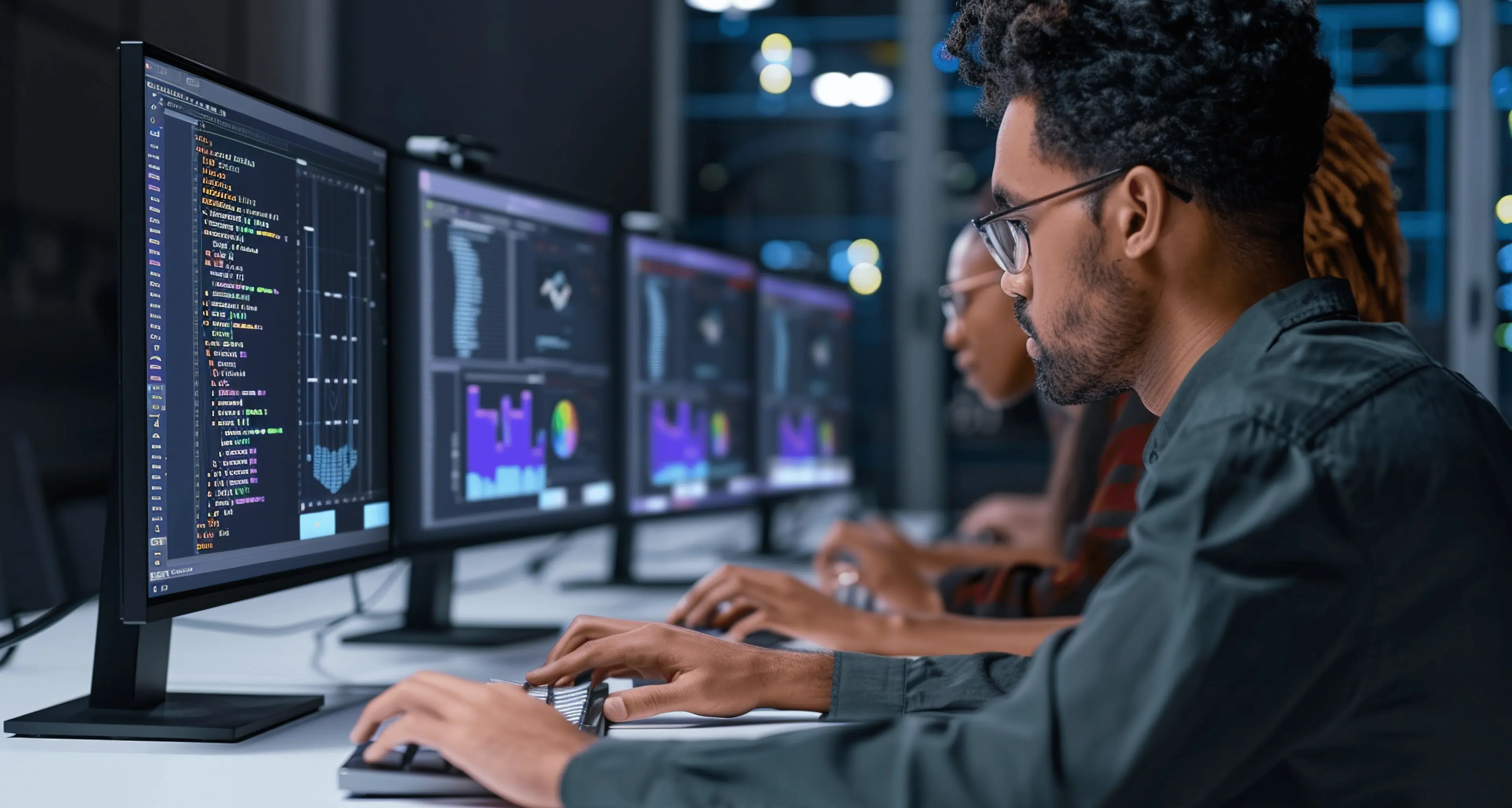 Person starring at monitors
